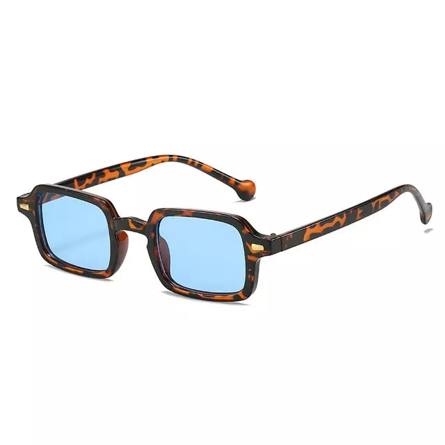Side view of black rectangular sunglasses showing sleek frame by Crown Eyewear