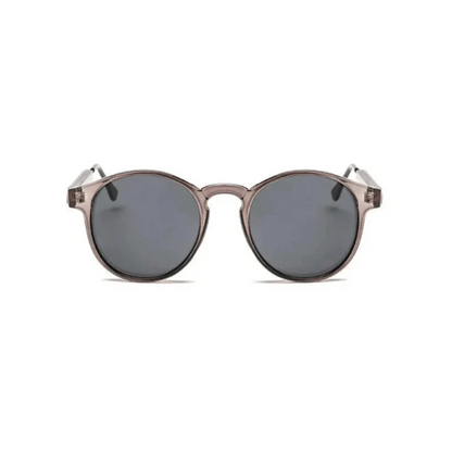 Unisex colored-frame sunglasses worn outdoors in contemporary style by Crown Eyewear