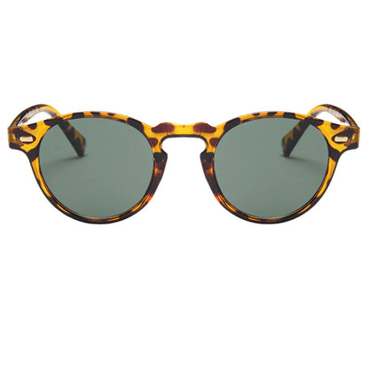 Unisex tinted sunglasses worn outdoors in sleek modern style by Crown Eyewear